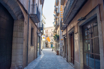 view on a street of the medieval city of Girona, Catalonia, Spain