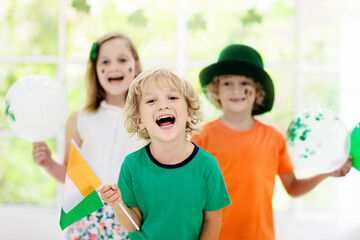 Kids celebrate St Patrick Day. Irish holiday.