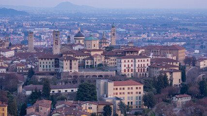 Bergamo. One of the beautiful city in Italy. Landscape at the old town from the hill during sunset. Amazing view of the towers, bell towers and main churches. Touristic destination. Best of Italy