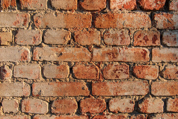 old brown brick wall as background