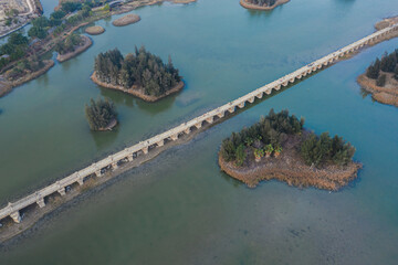 Aerial view of Anping Bridge, an ancient Song dynasty stone beam bridge in Fujian province at dusk
