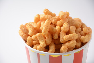 Israeli famous snack Bamba - made of peanut butter. Peanut Flips or peanut puffs