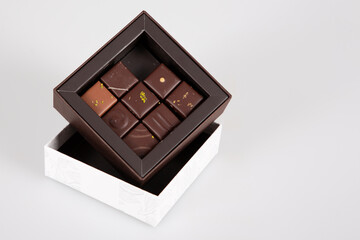 Assortment of variety fine artisanal chocolate pralines candies in little gift box