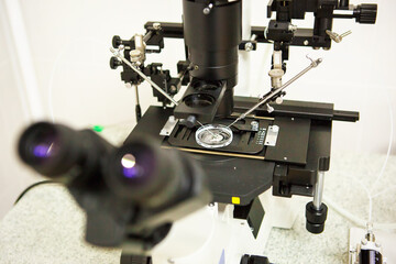Microscope and optical equipment in the laboratory of the artificial insemination clinic. The invention of the vaccine, IVF. Tests, fertilization of the egg. 