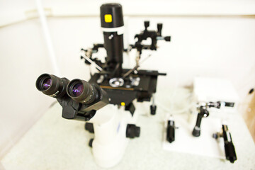 Microscope and optical equipment in the laboratory of the artificial insemination clinic. The invention of the vaccine, IVF. Tests, fertilization of the egg. 