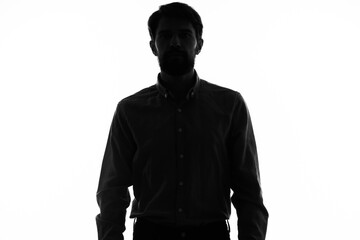 Obraz premium black silhouette of a man on a white background cropped view model