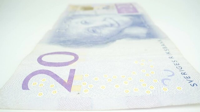 The 20 Krona bill on the table with the face of Astrid Lindgren