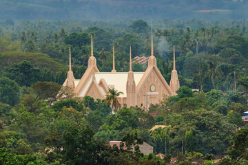 Church along the jungle bewteen lush tropical palm trees, Negros, Philippines