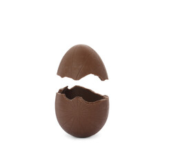 Broken milk chocolate egg on white background