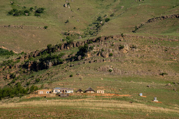 Fototapeta premium Old and new houses in the Mweni region of the Drakensberg mountains. 