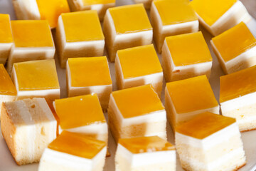 Mango Cheese Cake sliced on a plate