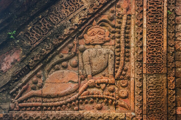 Carved terracotta detail of mythological creature on beautiful ancient temple in Puthia, Rajshahi district, Bangladesh