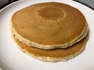 Two pancakes on a plate