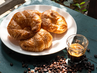 cup of coffee and croissant