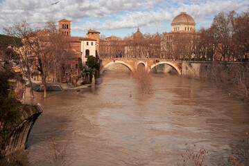 River Tiber in flood, the docks of the Tiber Island are submerged in water