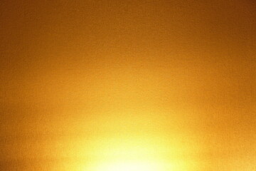 The lamp shines with warm light on the wall. Warm lighting. background or texture