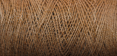 Skein of jute rope as background. Closeup.