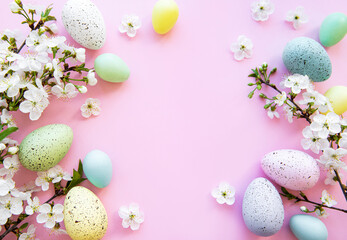Fototapeta na wymiar Colorful Easter eggs with spring blossom flowers