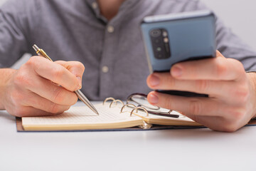 hand writing on a notebook