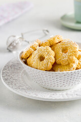 Tea cookies on a delicate grey texture background.