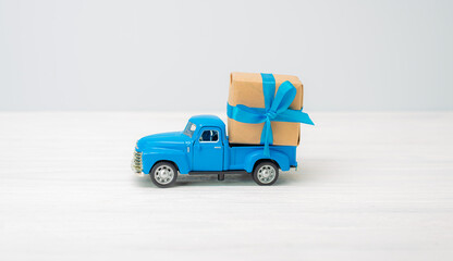 gift package on the small blue car