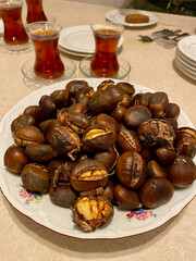 Chestnuts with Turkish Tea. Traditional Street Food.