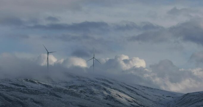 Wind tribunes on snow-covered mountains