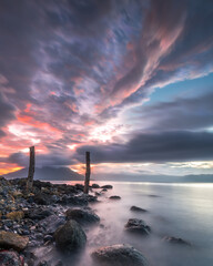 Beautiful sky on the alor besar beach after sunset