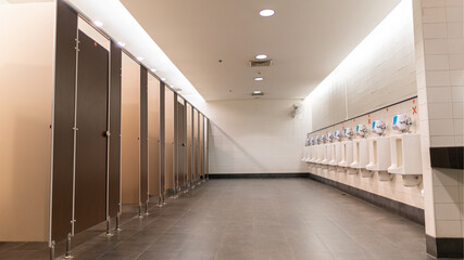 Empty public toilets in a wide-walled shopping mall and toilets.