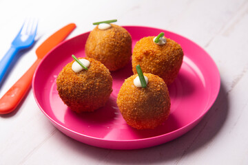 Traditional spanish croquettes tapas with avocado. Veggie tapa.