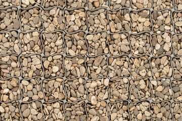 Gray coarse pebbles in cells