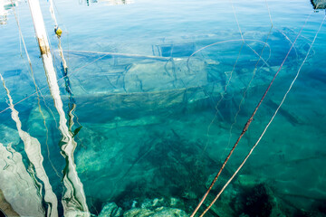 wrecked yacht next to the port of Aguilas, Spain