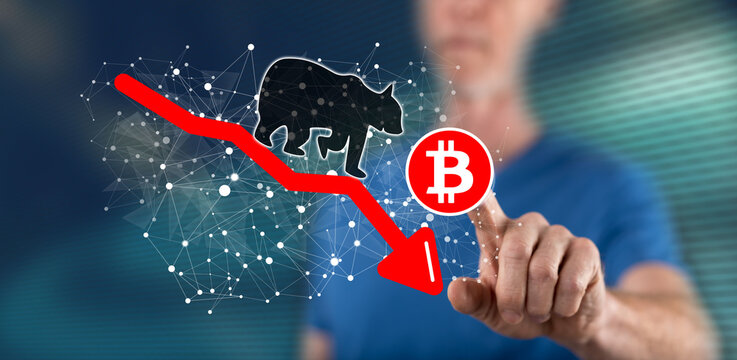 Man touching a bitcoin bearish trend concept