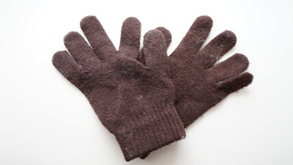 Gloves knitted of black wool yarn