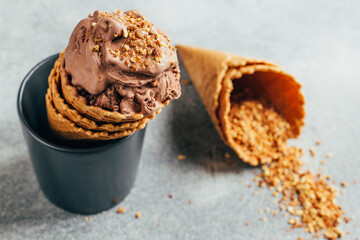 close up of chocolate ice cream in a waffle glass