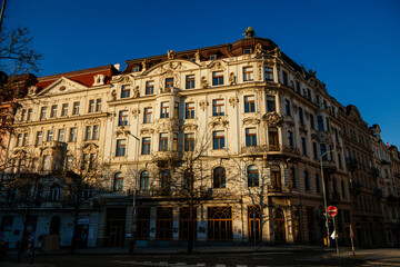 Fototapeta na wymiar Neo-renaissance historical building with stucco at the Vinohrady Quarte, Peace Square or Nameti Miru at sunny day, Prague, Czech Republic