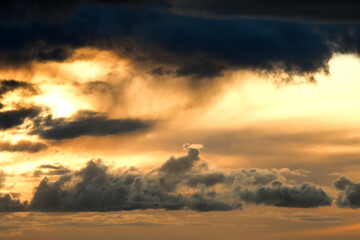 dramatic sunset sky with stormy clouds