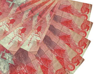 50 Philippine piso bills lies isolated on white background with copy space stacked in fan shape...