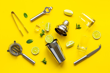 Mojito cocktail set with bar tools and utensils with lime and mint, flat lay