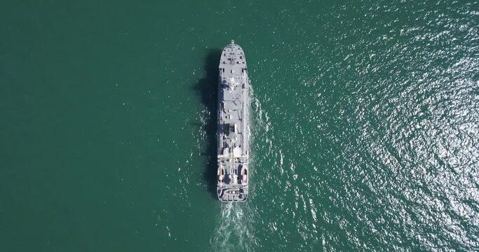 Aerial view of naval ship, battle ship, warship, Military ship resilient and armed with weapon systems, though armament on troop transports. support navy ship. Military sea transport.