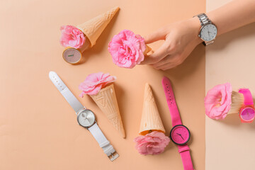 Obraz na płótnie Canvas Female hand and stylish wrist watches on color background
