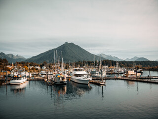 View Of Sitka Alaska Boats and Buildings from the Water with Mountain Background