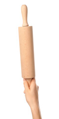 Female hand with rolling pin on white background