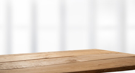 empty wooden table on background of abstract blur white interior, montage, product display, inside and window..