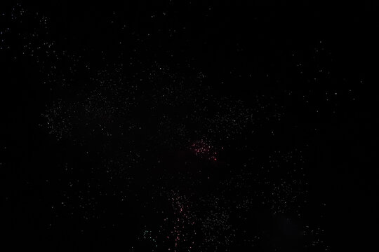 Stardust From Fireworks In The Black Sky 