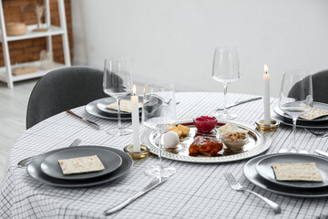 Passover Seder plate with traditional food on served table