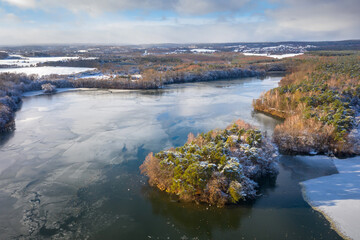 Aerial landscape of the frozen lake in Poland at winter