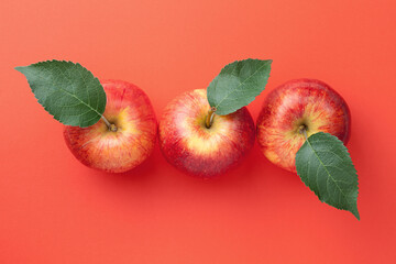 Red Apples With Leaves Over Paper Background