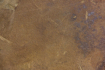 Outdoor brown fractured sandstone surface.