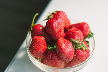 strawberries in a glass bowl